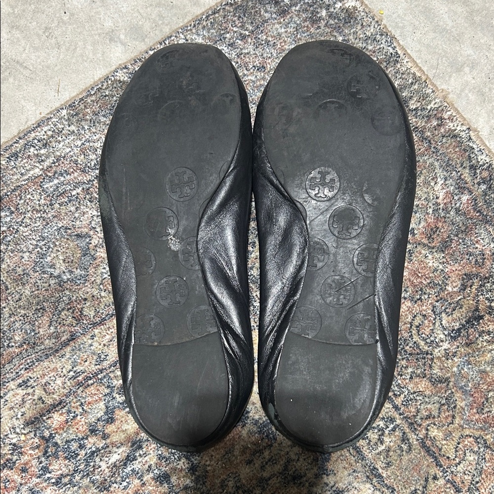 Tory Burch Black Flats with Silver Emblem - Picture 2 of 4